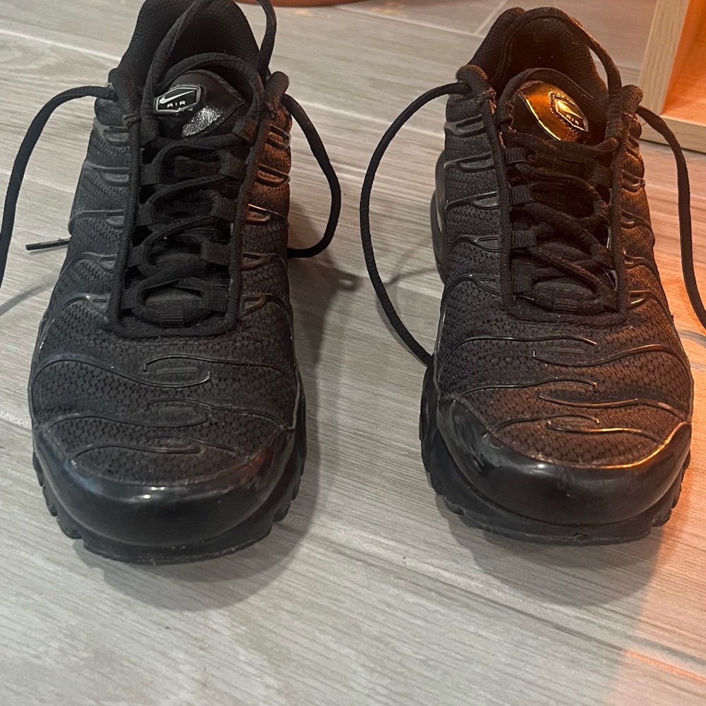 Nike Black Athletic Shoes with Tuned Air Cushioning